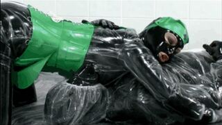 Black rubber couple wrapped in plastic coats - Part 1 of 2 - Blowjob and Piss mania