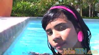 Tobie teen masturbating outdoors by the pool