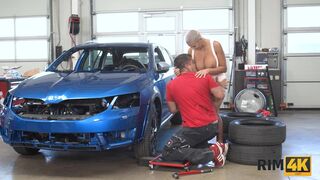 Blonde with giants tits licks car mechanics ass and gets fucked