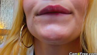 Blonde swallows rubber cock and gags hard