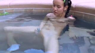 Teen tiny tabby toying her pussy in hot tub