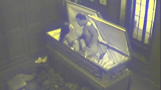 Slut fucks in massive coffin