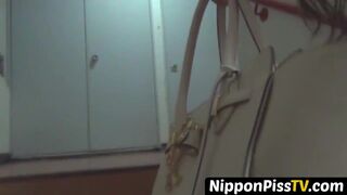 Japanese minx has shaggy pussy peeing in lobby