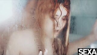 Sexy redhead gives a hot blowjob then fucks her man in the shower