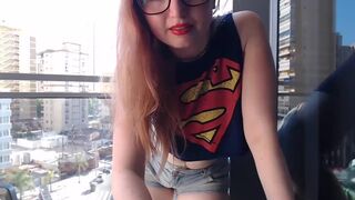 Hot gamer girl clothed flashing in balcony outdoor