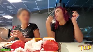 Two naughty girls making out with their breasts out while eating at McDonald's - Official Tattooed Angel