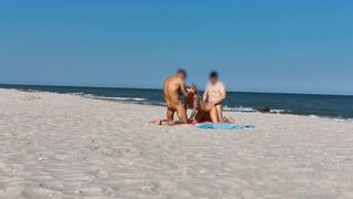 Sharing my girl with a stranger on the public beach. Threesome WetKelly.