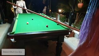 Two naked sluts play billiards in a night bar