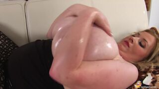 chubby milf shows her oiled monsters